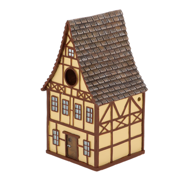 geel vakwerk vogel huis voorkant