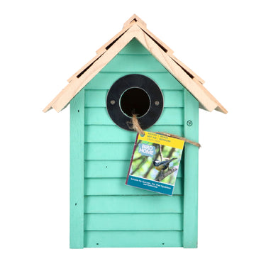 voorkant nest kast met een groen strandhuis design