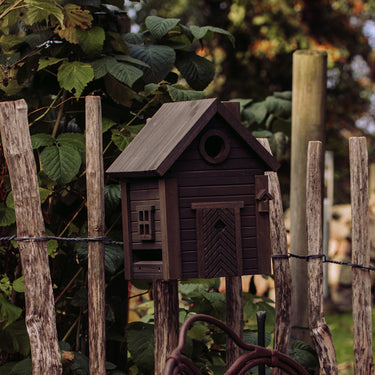 multiholk green umber aan houten hek